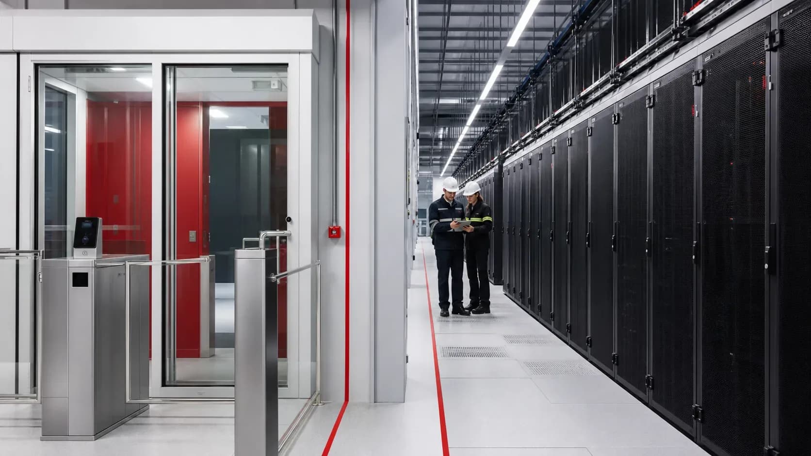 Engineers inspecting a secure, on-site Canadian data center